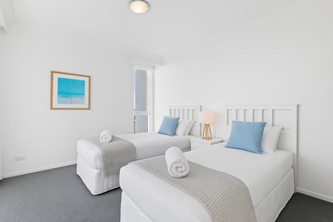 Bedroom 2 with ocean views, secured windows. Perfect for children