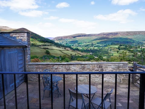 The view from the private terrace with seating for four (lockable bike sheds on the left)