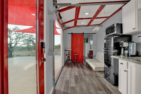 Cozy kitchen space with essentials — perfect for morning coffee or late-night snacks.