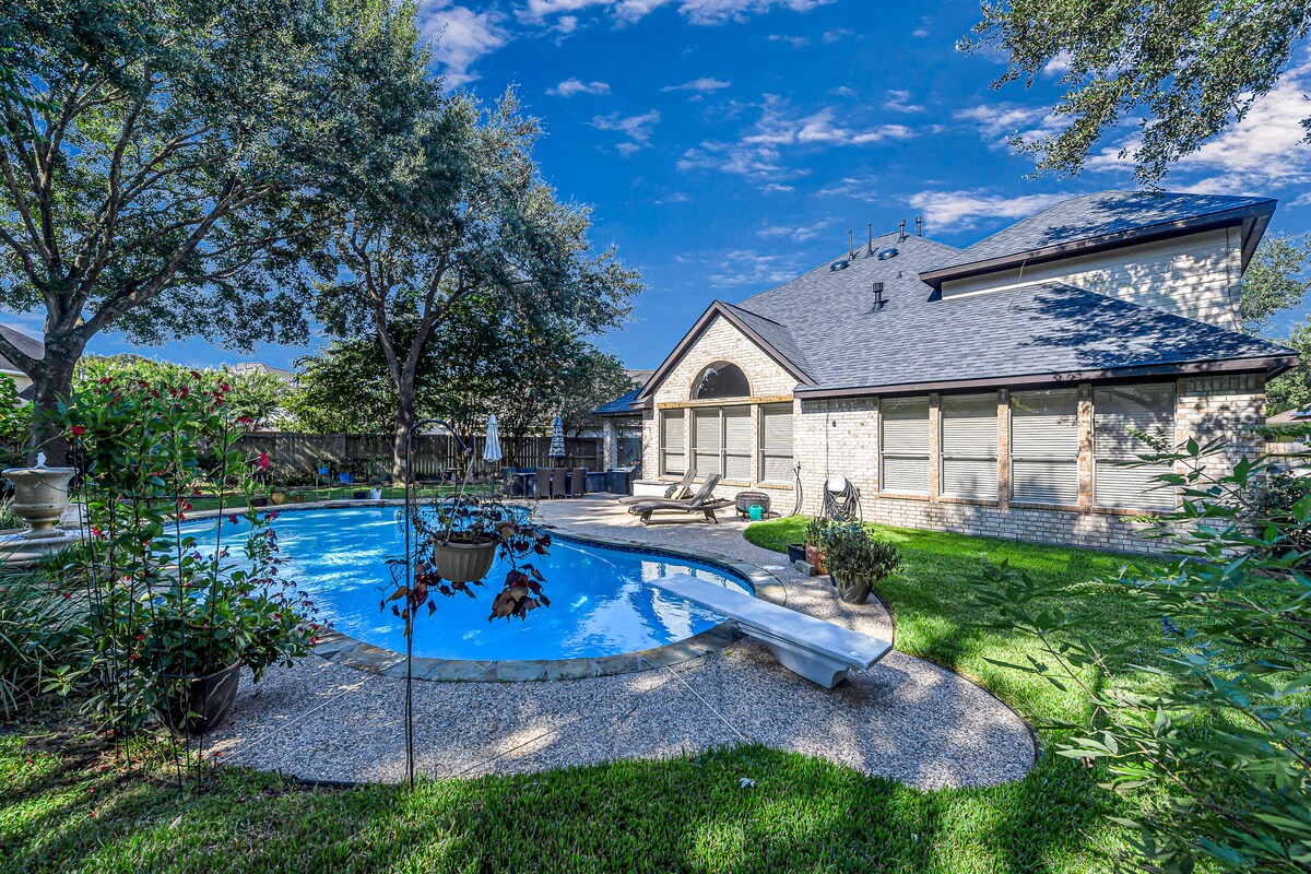 Spacious backyard with plenty of room to swim and play.
