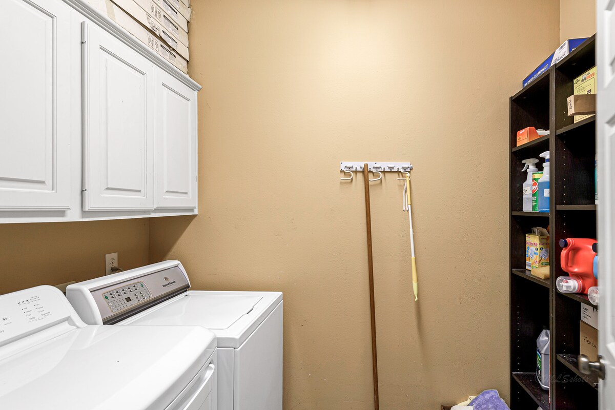 The laundry room has a full washer and dryer and provides detergent and extra cleaning supplies.