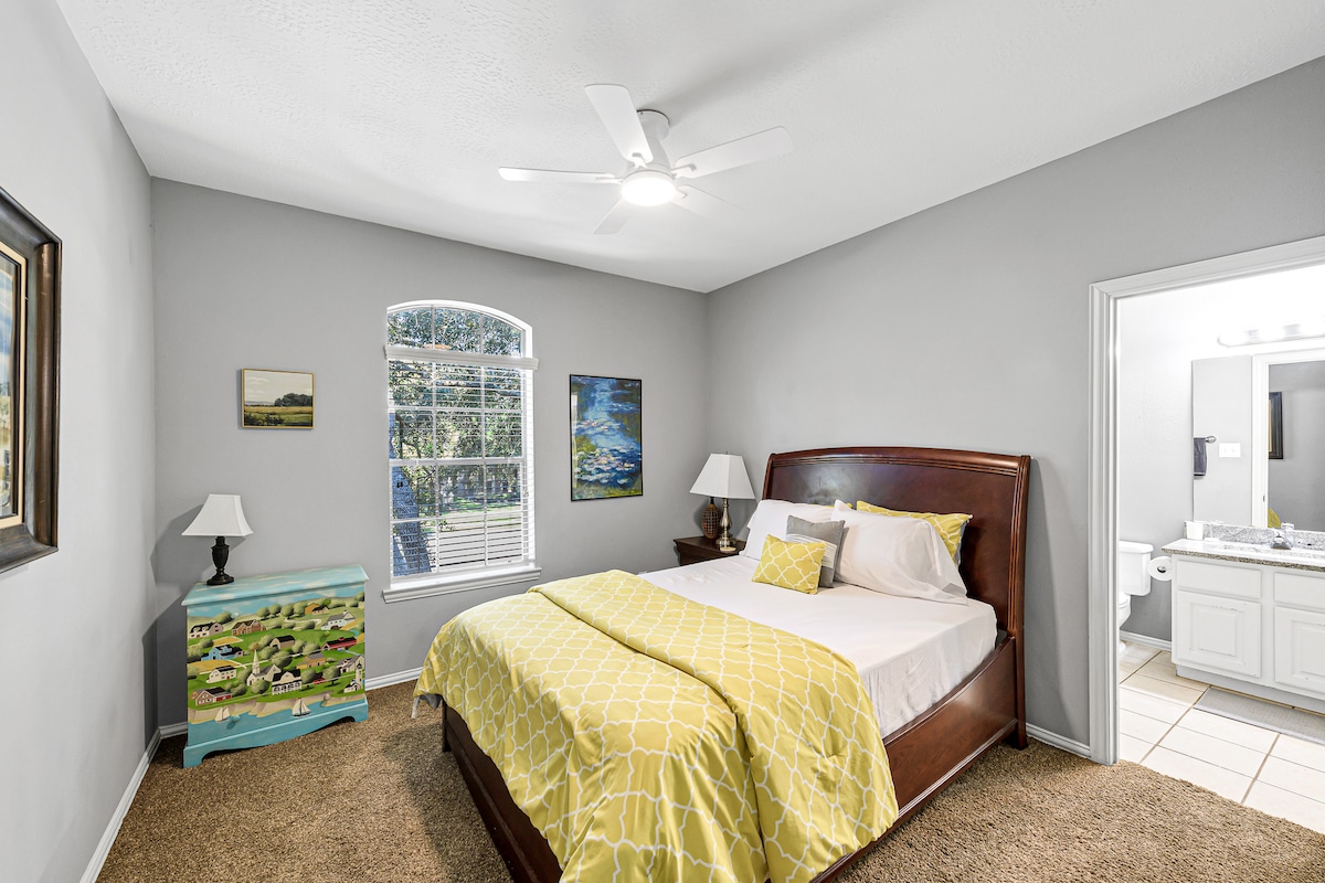 Bright and simple bedroom with a comfortable bed for restful nights.