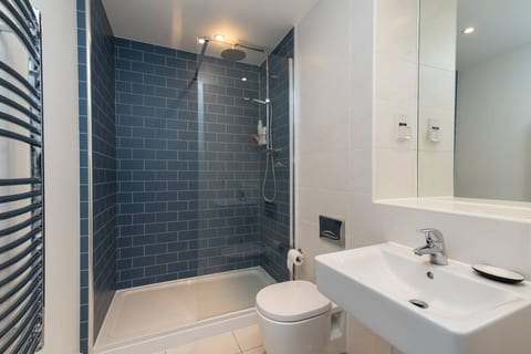 Bathroom with walk in rain shower