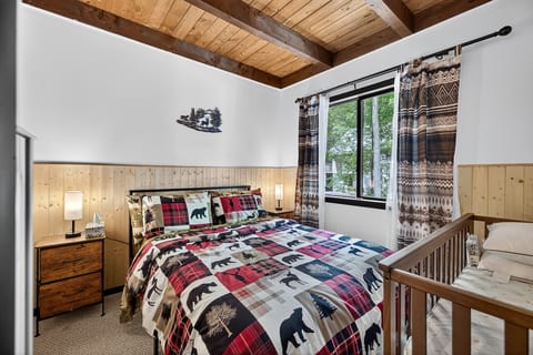 imagine yourself waking up in this beautiful bed with tongue and groove wood ceilings and tongue and groove pine walls