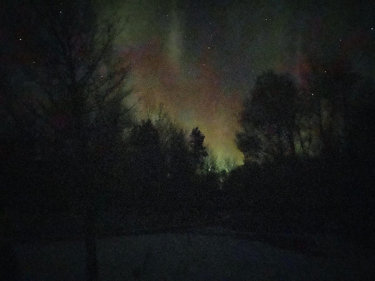 Northern Lights from right outside front door of Cabin Fevers.