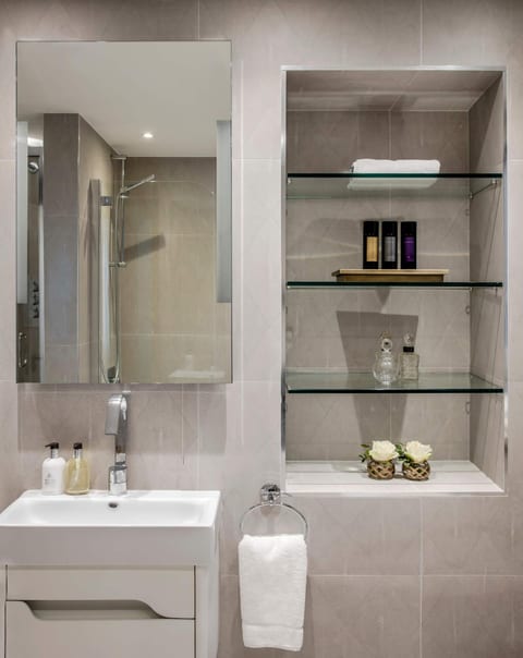 Elegant 4-Bed Apartment with Balcony & View