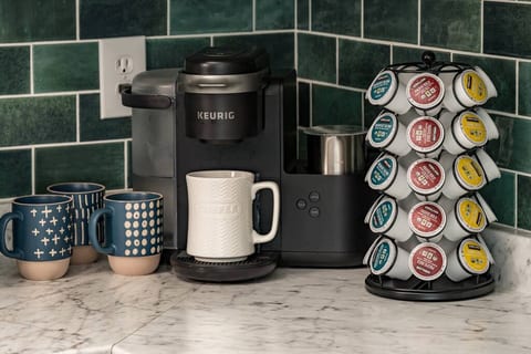 Fuel your mornings with our Keurig coffee bar — pods and mugs included for a no-fuss start to your day.