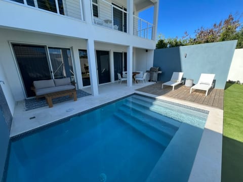 Sit in the pool, lay on the chaises, sit in the outdoor lounge or sit at the outdoor table. Enjoy paradise.