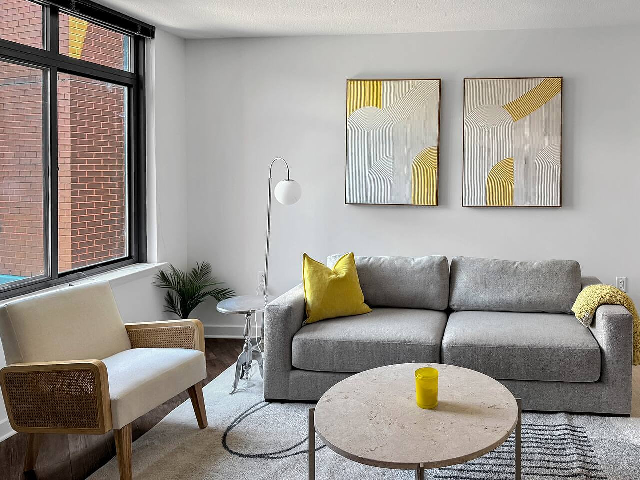 Modern living room with bright accents and natural light.