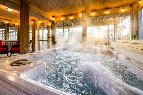 Hot Tub - Enjoy the ultimate privacy when you are staying in this amazing home with a screened-in porch!