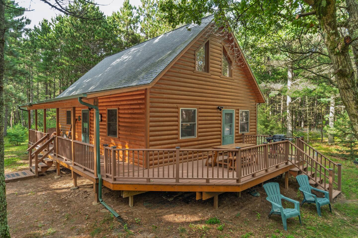 Spacious yard with fire pit, treehouse with slide, grill, picnic table, and plenty of seating. A perfect outdoor space for family fun, dining, and evenings under the stars.