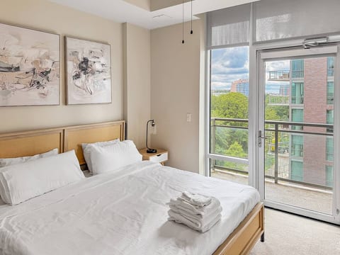 Sunlit 1BR |Tyson High-Rise| Pool + Parking| Patio