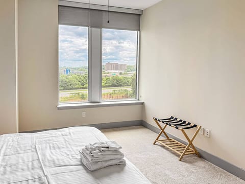 Calm Green Oak 2BR|2BTH – Tysons | Pool View Patio