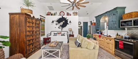 Lovely curated decor. Vaulted dormer creates light and volume yet still so cozy.