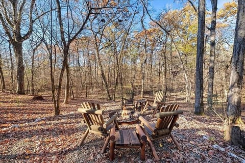 Gather around the outdoor fire pit for s’mores, stargazing, and cozy nights under the trees. A perfect spot to unwind, connect, and enjoy the peaceful forest setting.