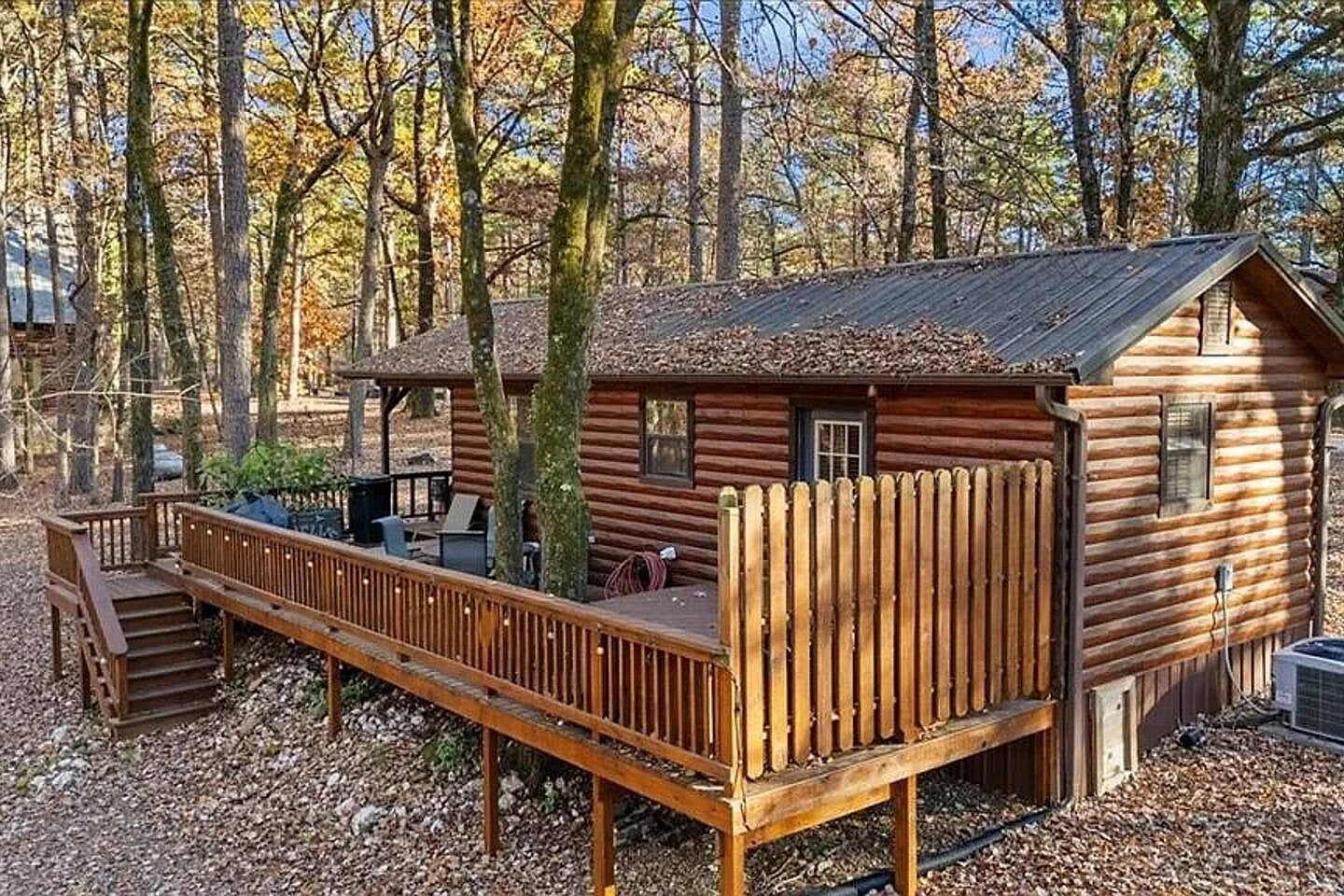 Cozy woodland cabin with a spacious private deck—perfect for morning coffee, grilling, or unwinding in nature. Surrounded by trees, this peaceful escape offers true privacy and a relaxing forest atmosphere.