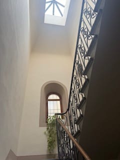 The staircase leading to the first floor apartment