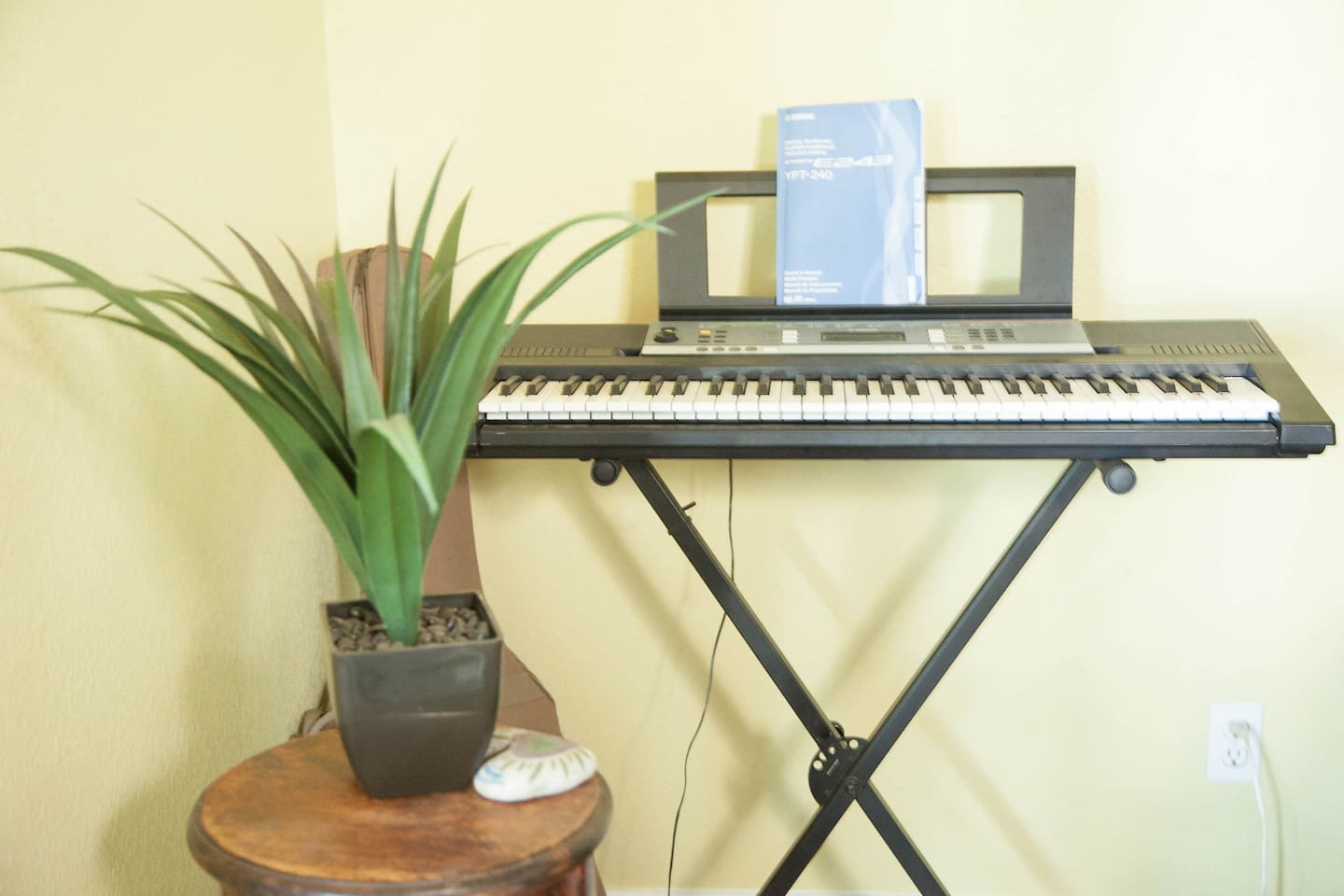 We love music! Keyboard, guitar, drum and gong in the living room