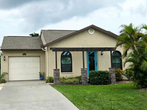 Well maintained exterior with new roof and hurricane windows.