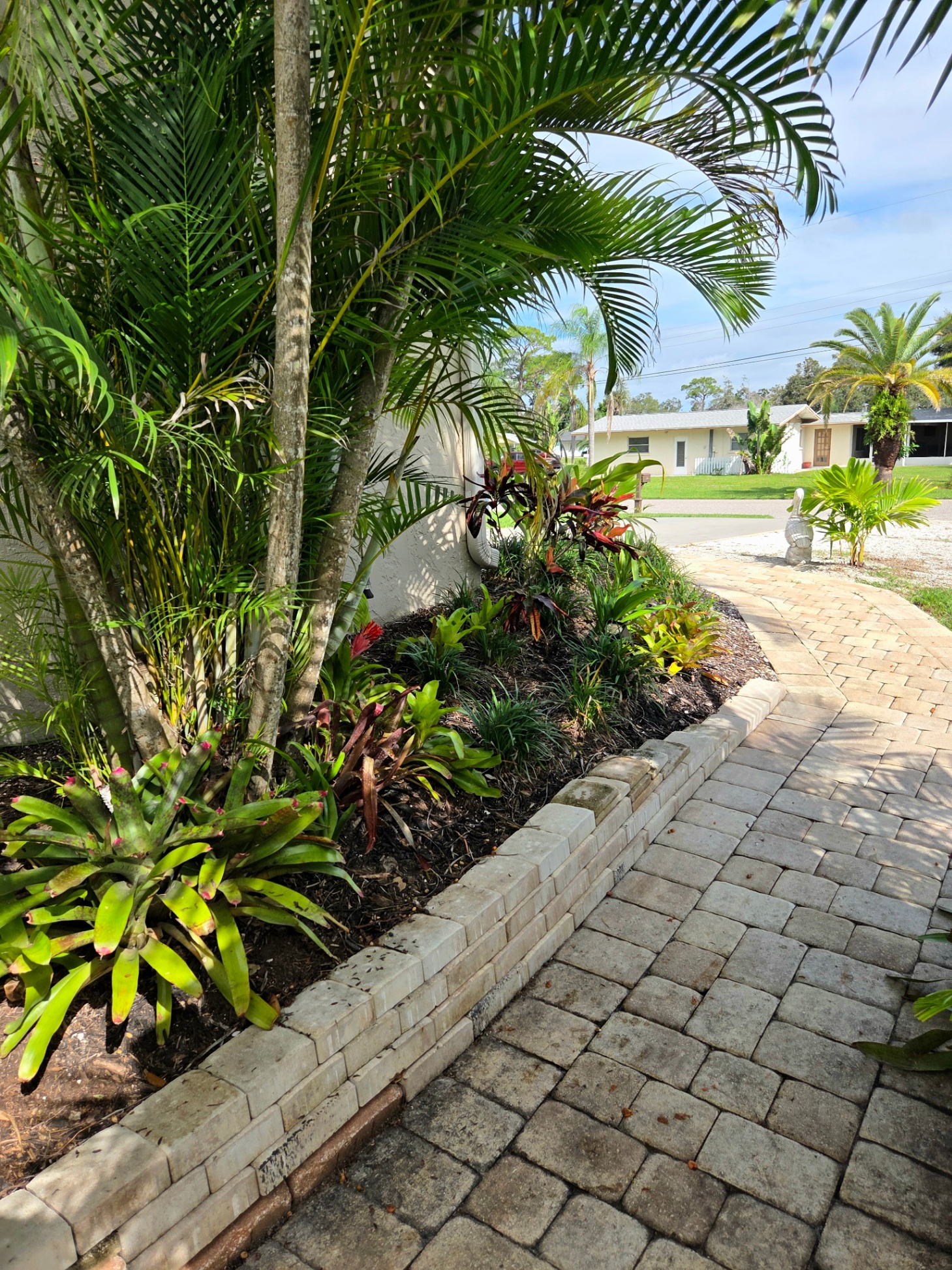 Paver path from front of house all the way to the pool. No need to track sand inside.