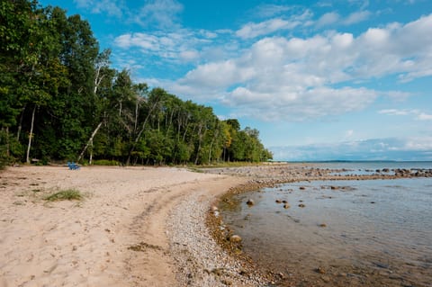 Sandy beach right outside your door, perfect for swimming and sunbathing