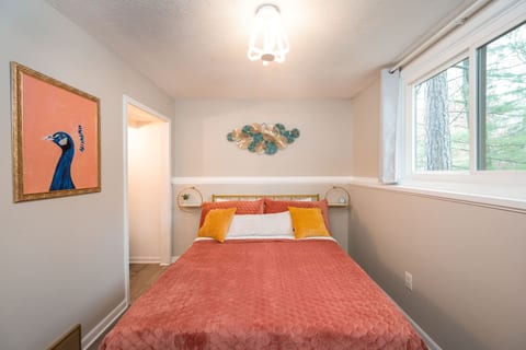 Funky and dazzling from the pillows to the LED light. New memory foam queen mattress, alternative down pillows, and blackout curtains.