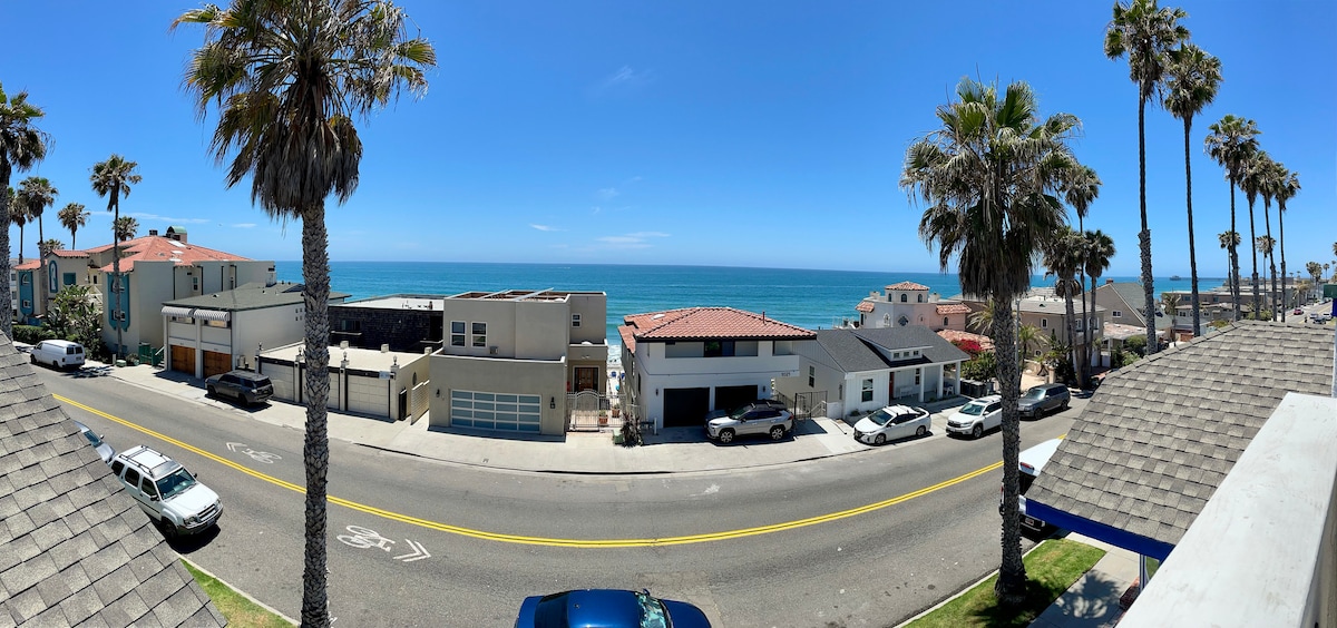 Panoramic ocean view all the way to the pier.