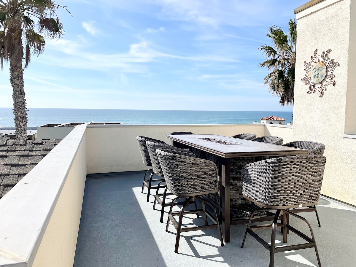 New counter height table with 8 swivel chairs and fire pit for the cooler nights.