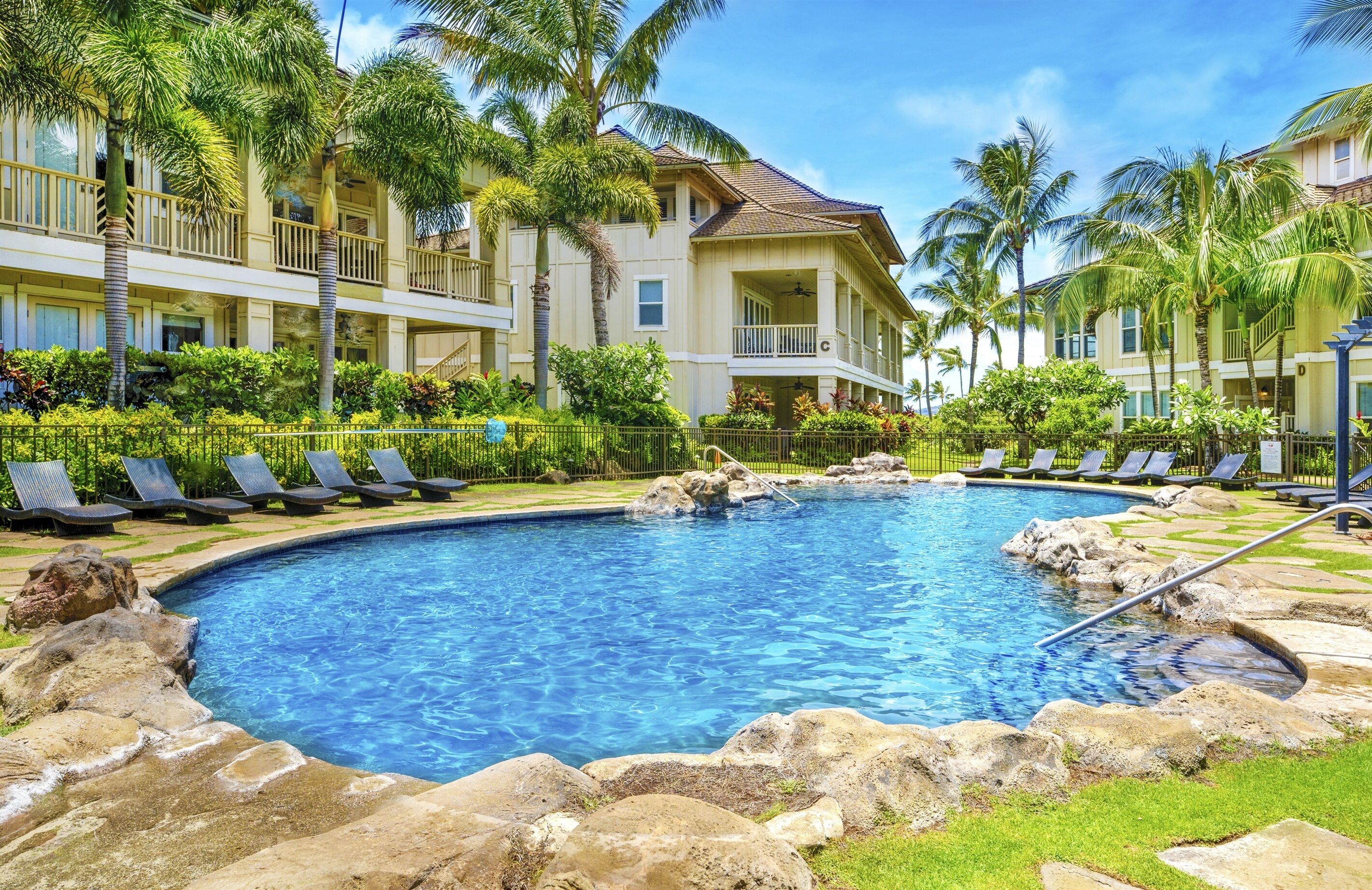 Enjoy a cocktail next to the resort style pool.