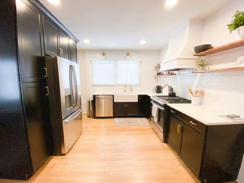 Spacious kitchen with modern appliances and sleek design