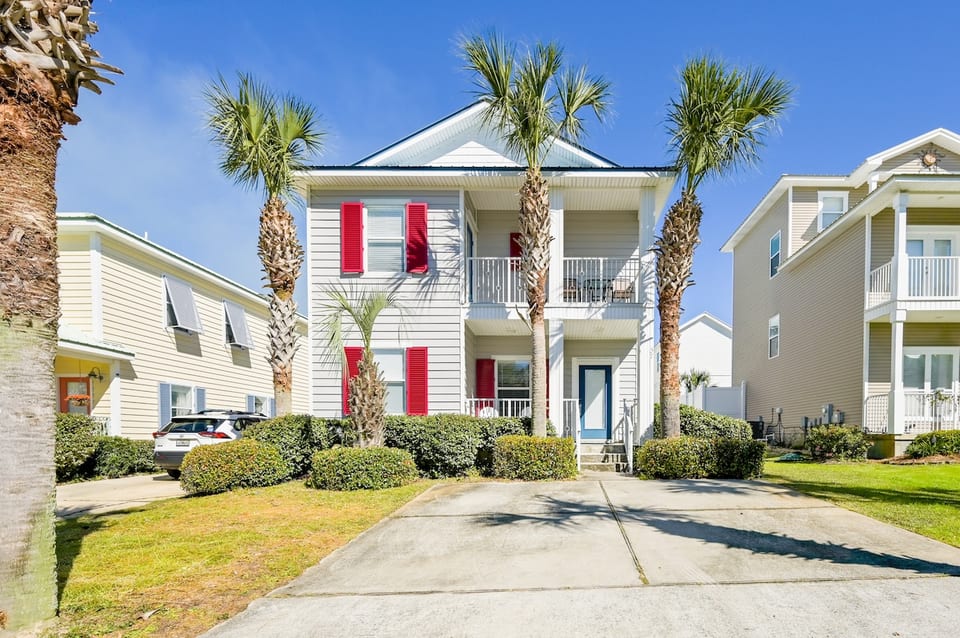 Two story single family home (4 BR & 3 BA, 1,953 sqft) with large space to park 3 vehicles. Shutters are BLUE now but haven't updated pictures.