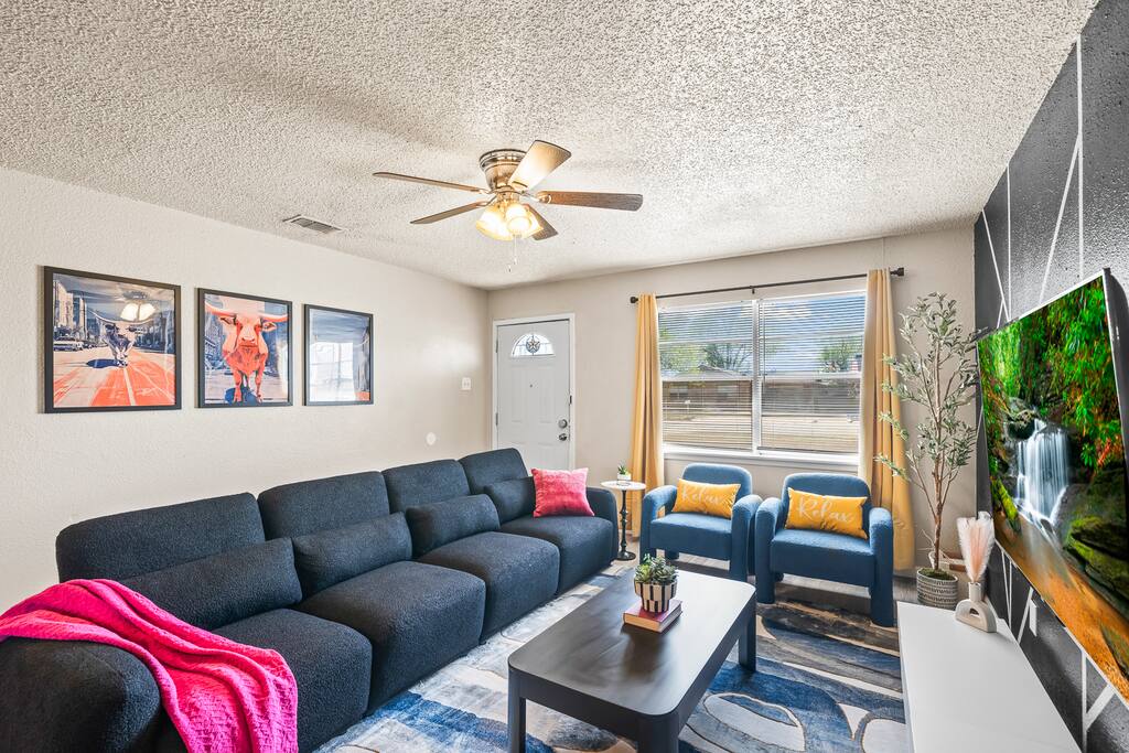 Inviting living room with a cozy feel, ideal for unwinding and laid-back lounging.