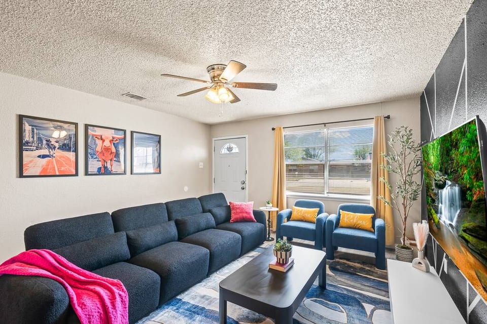 Inviting living room with a cozy feel, ideal for unwinding and laid-back lounging.