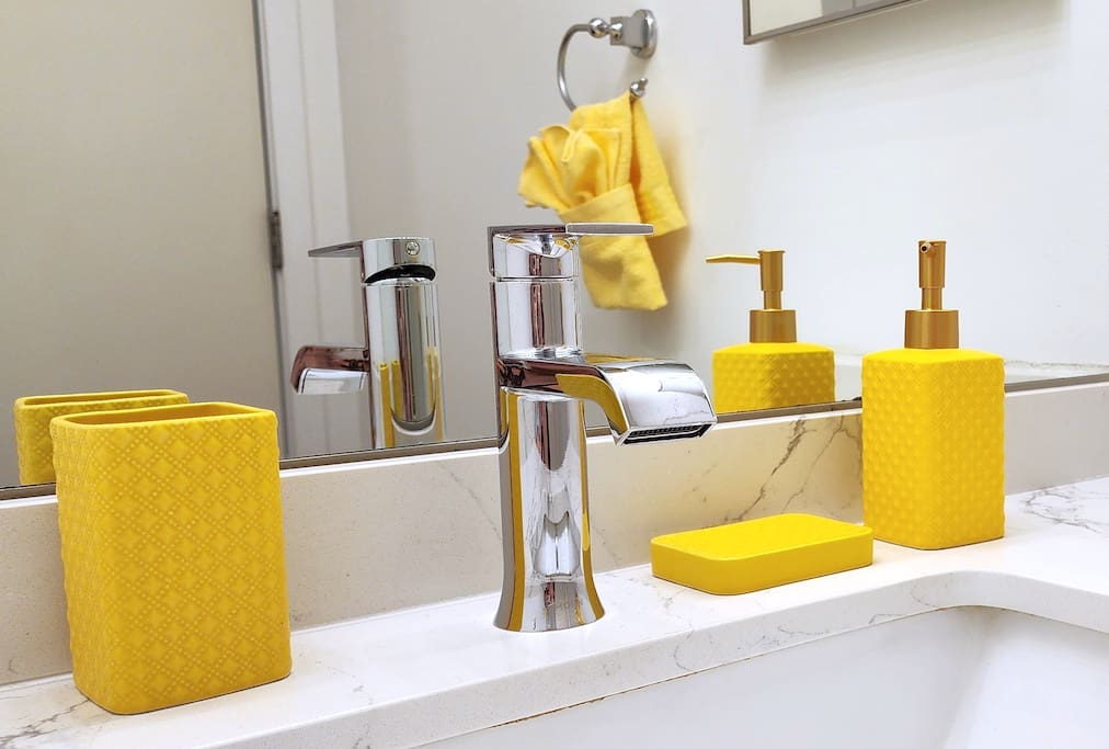 Yellow accents in bathroom