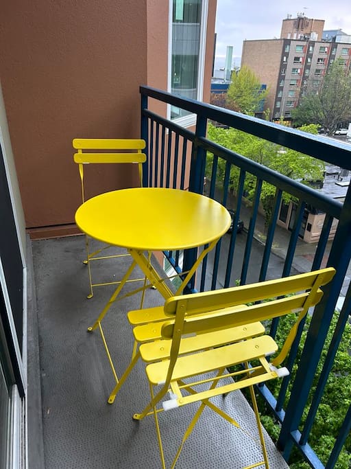 Lounge on the balcony enjoying the sights and sounds of the city