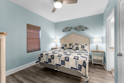 Master suite with king bed and direct ensuite access.