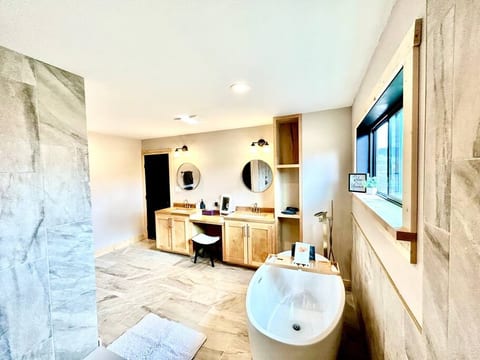 Double vanities, dedicated makeup area and custom butcher block vanities and built-ins give you plenty of space.