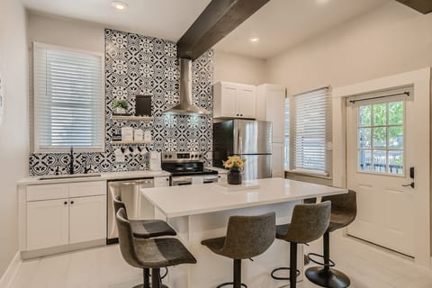 Kitchen Bar with Quartz Counter Tops.
