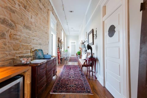 Kitchenette includes a wet bar, microwave, and wine and beer coolers
