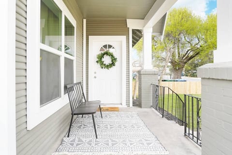 Step out onto our inviting outdoor patio at our Airbnb, a perfect space for enjoying the great outdoors. Bask in the sunshine or savor al fresco meals in a charming setting.