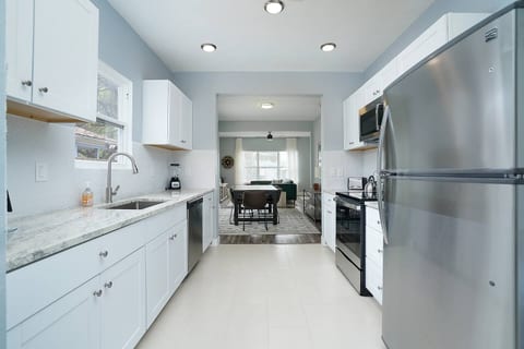 Enjoy the convenience of our well-appointed kitchen, equipped with modern appliances, a dishwasher, and ample counter space for meal preparation.