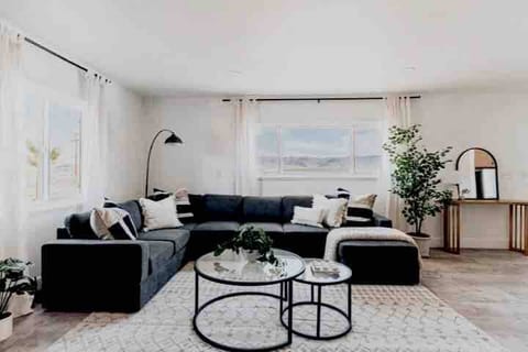 Welcome to our inviting living room, where comfort and style come together to create a truly memorable stay.