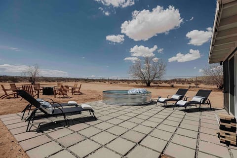 Immerse yourself in the serene desert atmosphere of our outdoor lounge, perfect for unwinding after a long day of exploring.