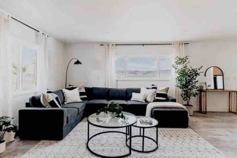 Welcome to our inviting living room, where comfort and style come together to create a truly memorable stay.