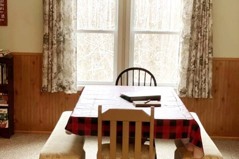 Step into our sleek dining area, featuring clean lines and minimalist design.