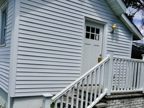 A Warm Welcome Awaits: Step through our Inviting Front Door and Experience Hospitality at Its Finest