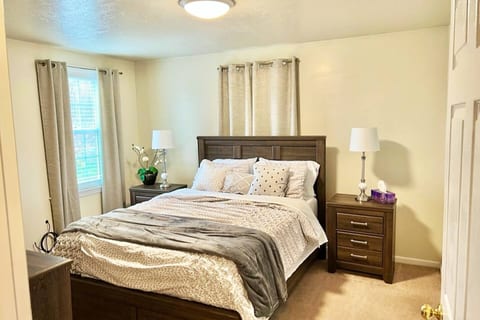 Sleep like royalty in this luxurious and spacious bedroom