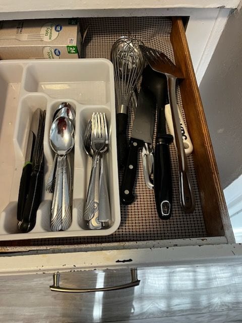 Well stocked kitchen. Kitchen drawer with utensils and cooking essentials
