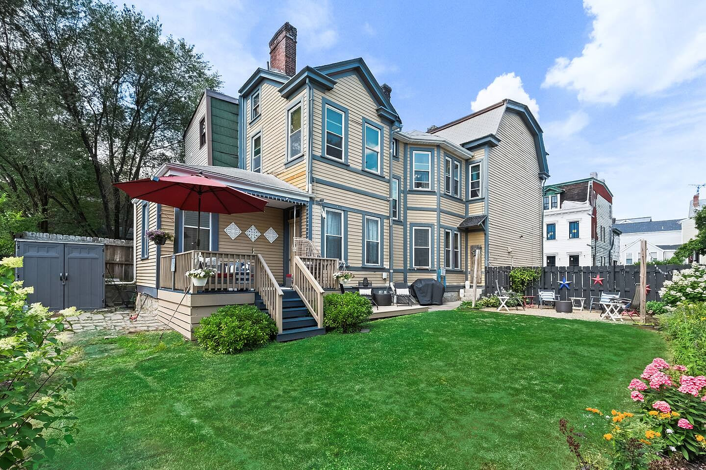 Lush backyard perfect for games, grilling, and outdoor family fun.