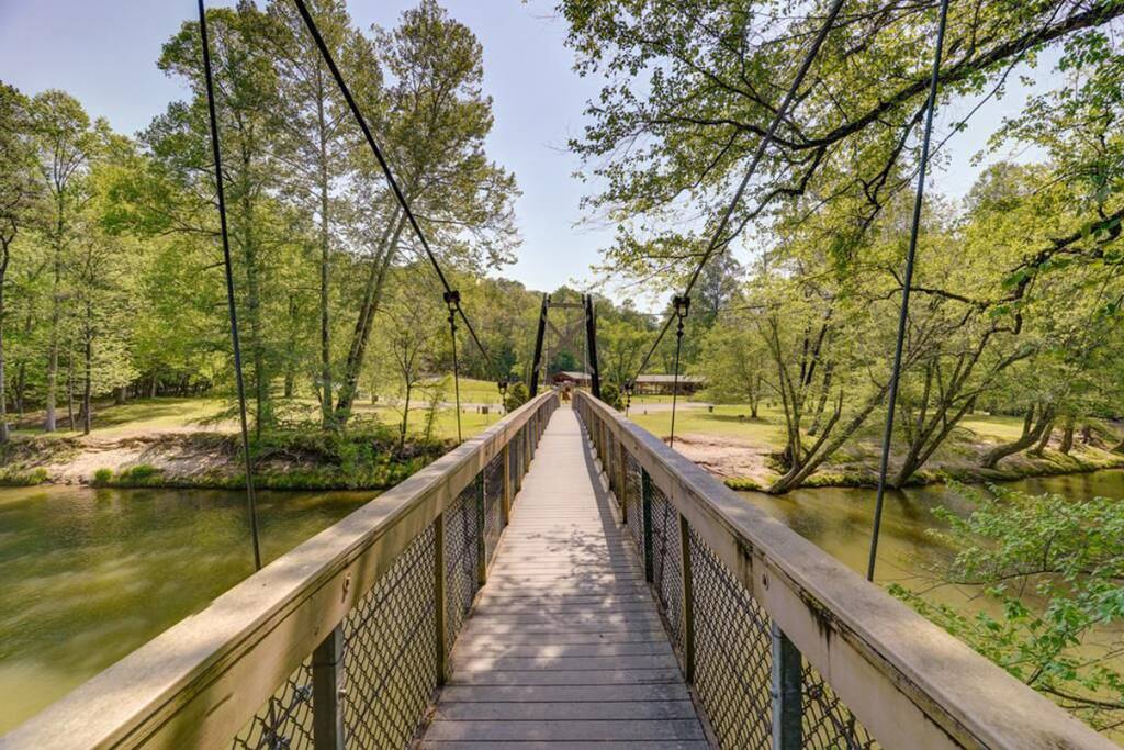 View of Fish Trap Park from the gorgeous suspension walking bridge over the Coosawattee River that connects Fish Trap Park to Riverside Pool. Riverside Pool is open seasonally. The indoor pool at the Rec Center is open year around - all included!!